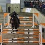 O' Reillys Wholesalers Newry sponsored HSI / Bluegrass Spring Tour Grand Prix winners, Daniel Coyle & Uptown Girl clear the double being urged on by the large crowd of spectators at Ravensdale Lodge on Sunday