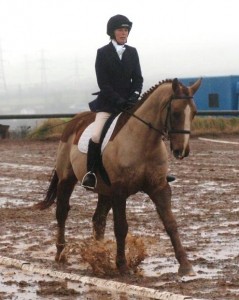 Barbara Hanna and Mercury brave it out in the sand arena