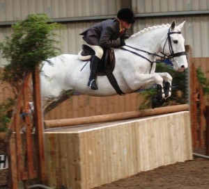 Stephanie Farren and "Sophie Bubbles" zoom over the Intermediate course