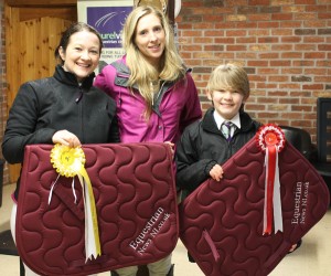 Emma Fleming presents Gillian McCann and Andrew Clark with their Equestrian News NI prizes