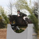 Robbie McNeil competing in the 90cm Working Hunter Class