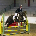 Adam Shortt with Henry going on to win the 80cm class at Ecclesville Show Jumping League Finals in Fintona