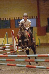 Adam Shortt with Henry jumps clear in the 80cm class at the Ecclesville Show Jumping League in FIntona