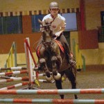 Adam Shortt with Henry jumps clear in the 80cm class at the Ecclesville Show Jumping League in FIntona