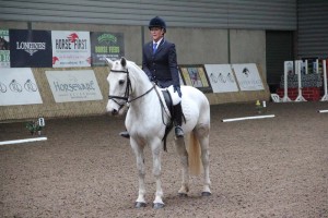 Class 2 winner, Evanne Mc Kenna & Bella Rosi from the Castle Leslie riding club salute the judge at the end of their dressage test at the Cemac Group sponsored league at Ravensdale Lodge on Sunday.