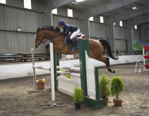 Kathryn Hutchinson competiting at the SJI Horse Final in the 1.10 m class