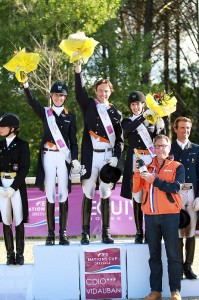 The Netherlands emerged victorious at the opening leg of the FEI Nations Cup™ Dressage pilot season at Vidauban, France yesterday.  Pictured on the podium are Katja Gevers, Laurens van Lieren and Stephanie Peters with trainer, Wim Ernes. Photo: FEI/Rui Pedro Godinho.