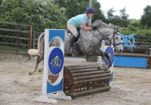 Ann Mc Cusker & Russell jump the joker fence at Ravensdale Lodge's arena eventing league on Saturday Photo: Niall Connolly.