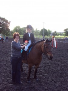 Maria King (Ecclesville Centre) and Jodie Lyons and Bubbles winner of 60cm class