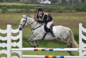 Sheridan Andrews and Lacey on their way to winning prize for fastest clear round