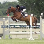 Sarah McLean and Diamond Obelix clearing the last fence in style to take the lead at the end of the A riders