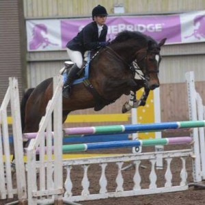 Jackie Hanna and Cora on their way to earning one of their red rosettes