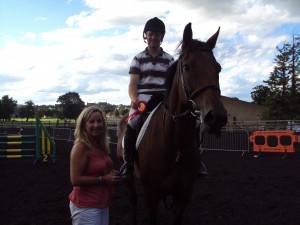 Simon Scott and Pretty Lady receiving first prize in the Horse Open Class from Anne Morris, Judge