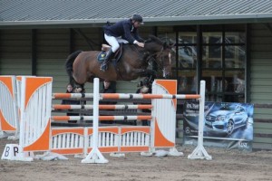 Caption as follows: 2002 world show jumping champion Dermott Lennon flying high with Vampire on their way to winning the MSL Mercedes-Benz Autumn Grand Prix at Ravensdale Lodge.