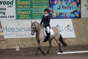 Roisin Moorhead & Dunsallen ride a lovely test to win the Novice class at the O' Reillys Wholesalers Newry sponsored €1000 indoor dressage league at Ravensdale Lodge on Sunday.