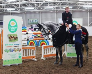 Photo coutesy of jumpinaction.net Alexander Butler and Will Wimble winners of the Gain/Alltech Autumn Grand Prix League. Presentation by Adrienne McGuinness of Golden Irish Eggs, Castlebalaney, main sponsors of the GP class.