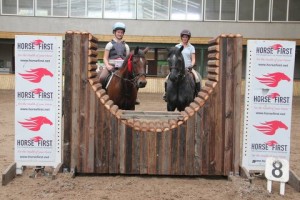 Clear all the way, Tess Meade & Chester are joined by Victoria Craig & Rocky at the Horse First joker fence after going clear in the 85cm class at the Horse First sponsored indoor arena eventing league at Ravensdale Lodge on Saturday, Photo: Niall Connolly