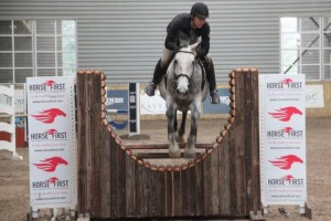 Ciaran Thompson & Silver Linings on a flier in the 1m class at the Horse First indoor arena eventing league at Ravensdale Lodge on Saturday: Photo: Niall Connolly