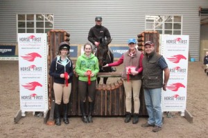  "Winner all right": Paddy Hughes of sponsors Horse First presents the class product prize to Sarah Hennessy who drew the lucky rosette. Also in the photo are Orla Mc Gowan, Michelle Duggan, Henrique Butfallas & Rainy Day (mounted) who all went clear in the 85dm class at the Horse First indoor arena eventing league at Ravensdale Lodge on Saturday. Photo: Niall Connolly.