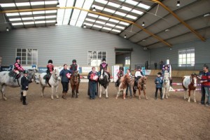 Prize winners from the X poles class at Ravensdale Lodge line up with their hampers and prizes from Botanica International, Horse First, Mackins Horse Feeds, O' Reillys Wholesalers Newry, The Cemac Group & Moorhill Saddlery at the Bumper Halloween Show held on Sunday. Photo: Niall Connolly