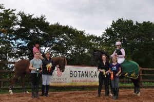 Class 2 League Winners, Sponsored by Botanica. From left; 4th - Anna Fleming, 2nd - Claire Dobbin on Louis, 3rd – Kate Russell, 6th –Suzy Patterson, 5th – Beth Taylor, 1st – Norma Ferguson on Chico Time