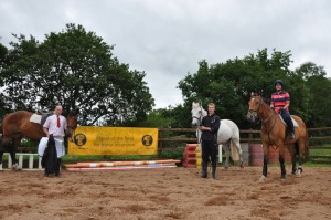 Class 4 – 1m Sponsored by NFU Mutual, Lisburn From left; 1st – Sam Goudy on Zaria.  2nd   - Alan Martin on Inishcara, 3rd - Sharon Cowan on Calin King,