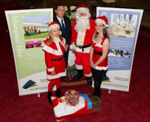 Saintfield Christmas Charity Ride Organiser Joan Cunningham, pictured with Horseweek's Bree Rutledge, who will be taking part in this years ride. Alistair McIlveen of North Down Marquees, main sponsor of the event and the Real Santa himself before the Christmas Rush.