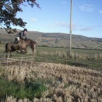 Orla Smith on Tiggy clears the gate