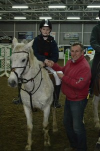 Michael Morgan & Shirley's Boy winners of the Watters Electrical voucher in the 1m class. Presentation  by James Kernan.