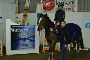 1st prize winner in the 1.10m class Amy McVerry on Captain Tate.  Amy also won the Watters Electrical voucher. Presentation by Linda Fahey.