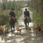 Huntsman Jonny Butler and Hunt Master Ian Holmes leading the hounds