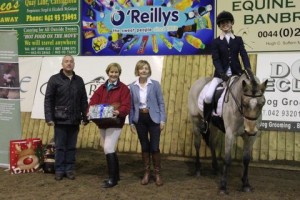  Photo: Class 3 & 4 league winner Roisin Muirhead pictured on "Dunsallen" shows her delight at having won €650 towards her nominated charities. Roisin is joined by Jan Dewhurst who was second in class 3, Maureen Magennis of sponsors O' Reillys Wholesalers Newry and judge David Patterson Photo: Niall Connolly.