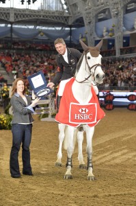  Andrew Nicholson (NZL), HSBC Rankings leader at the end of the 2013 Eventing season, was presented with a silver salver by HSBC Sponsorship Manager Kate Fullam at the London International Horse Show at Olympia (GBR) (Photo: FEI/Kit Houghton).