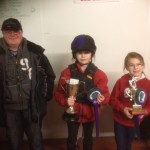 Ashley Hanna presents cups to  Friday night cup winners Zara burns and Shannon boville