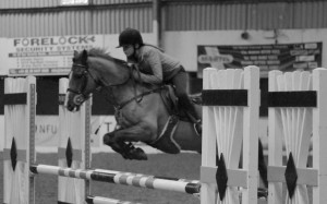 Ellie Rose Cassidy jumping clear in the 90cm on Chesty