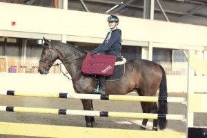 Shannon Robinson and Luna, clear in the 90cm and 1m classes and winners of the saddlecloth draw on the day