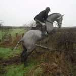 Simon Carson leaps the pole jump