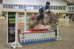 Leah Knight & Jewel ping the joker fence in the 85cm class at the Mackins Horse Feeds indoor arena eventing league at Ravensdale Lodge on Saturday afternoon: Photo: Niall Connolly.