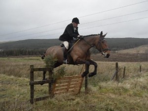 Mike Alcorn clearing the last fence of the day
