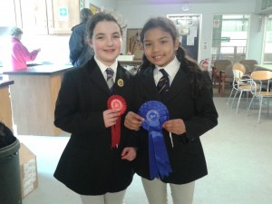 Ciara Owens & Kamryn McQuade with their rosettes for Class 4 at SVRC annual combined training show