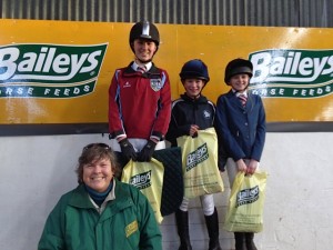 Judy Maxwell of BAILEYS HORSE FEEDS presents prizes to individual winners L-R 3rd Kirsten Patterson (Kilkeel High School), 1st Victoria Boville (Dromore High School), 2nd Melissa McKee Kilkeel High School)