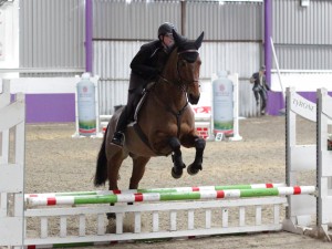 Joanne Wilkinson and Caspee jumping in the 80cm class