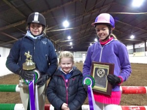 Caitlyn Patterson presents trophies to Friday night winners L-R Aoife Hamilton Quinn winner of Julie Patterson trophy, Sophie Price winner of Churchill Plaque