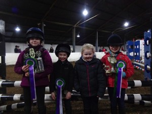 Caitlyn Patterson presents trophies to Friday night winners L-R Zara Burns winner of Neill Patterson Trophy, Robert Russell winner of Scott Murry Trophy, Shannon Boville winner of Ross Murry Trophy