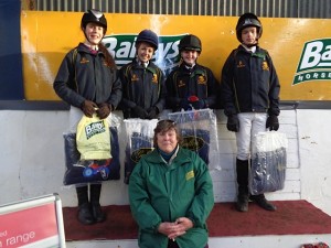 Judy Maxwell of BAILEYS HORSE FEEDS presents prizes to 2nd placed team - Down High Flyers L-R Tilly Horder, Sophie Price, Alex Clelland, Jacob Morrow