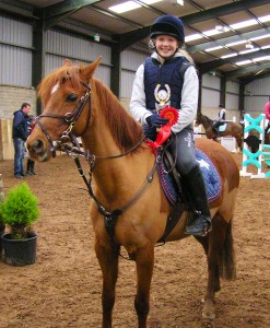 The winner from the 70 & 80cm classes Laura McKay riding Darcy