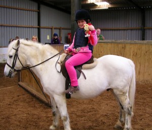 Grace Morton with her pony Rocky winning the 40cm class at Knockagh View's All Silver Showjumping day