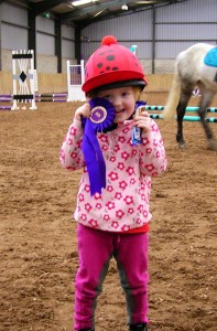 One of Knockagh's youngest competitors Eve Lindsay delighted with her winnings in the 30cm class at Knockagh View's showjumping day