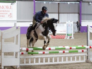 Connor Stewart and Killy jump in the 1m class at Portmore's unregistered show