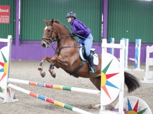 Stephanie Elliot and Flynn jump clear in the 1m class